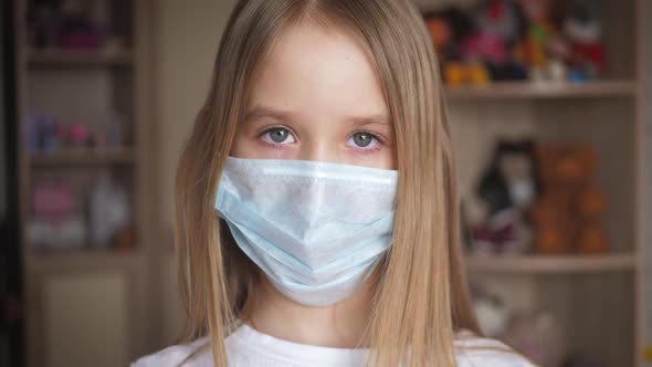 A Girl Wearing Mouth Mask Against Pandemic. Protection Against Virus and Infection. Concept of