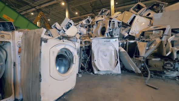 Discarded Washing Machines in a Junkyard Unit