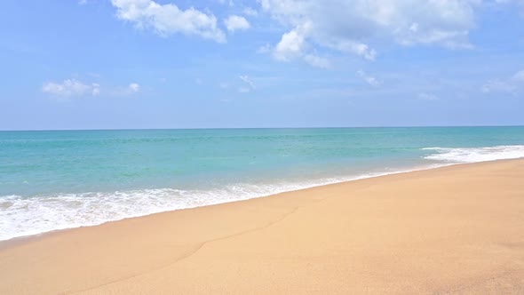 Beautiful tropical beach sea ocean with blue sky and white cloud