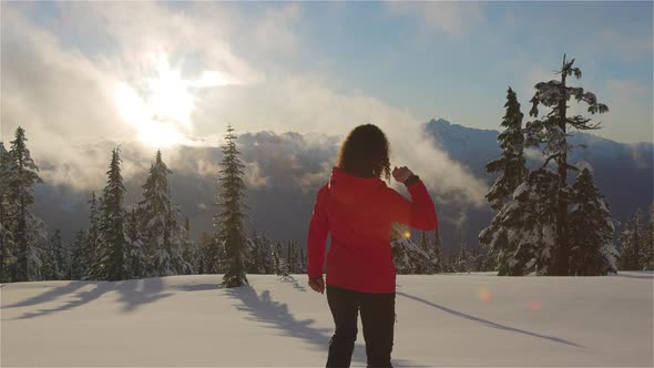 Adventure Woman Hiking on Top of Canadian Mountains