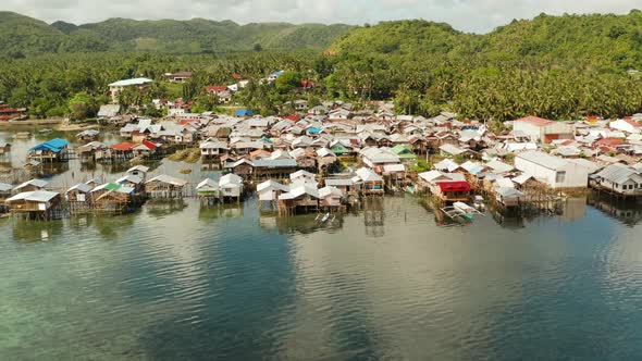 Fishing Village and Houses on Stilts. Dapa City, Siargao, Philippines