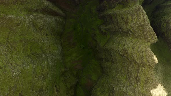 Amazing Aerial View Over Scenic Ravine of Hawaiian Massif. Unusual Ribbed Slopes Covered with Grass