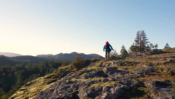 Male Hiker on a Rock Bluff Ridge on Vancouver Island, Canada, Lone Tree Hill