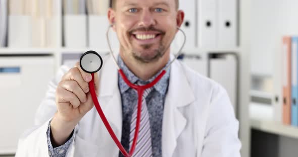 Young Smiling Doctor is Holding Stethoscope  Movie