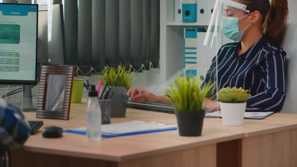 Disabled Businessman Cleaning Hands Before Typing