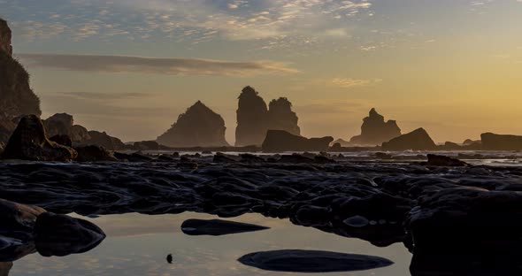 Timelapse in motion of a sunset over Motukiekie Beach, New Zealand, 4K H.264