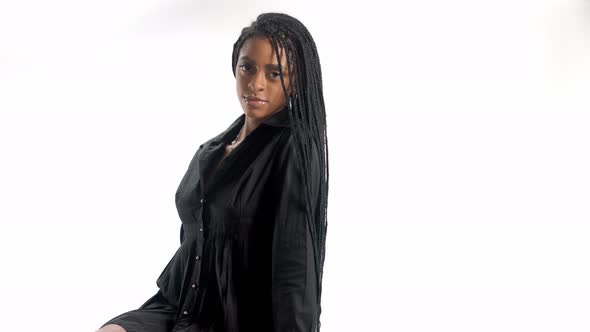 Mixed Race Woman with Hair Braids in Studio on White Closeup Portrait