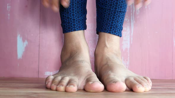 Woman Stretching Leg Toe-touch Stretch Exercising.