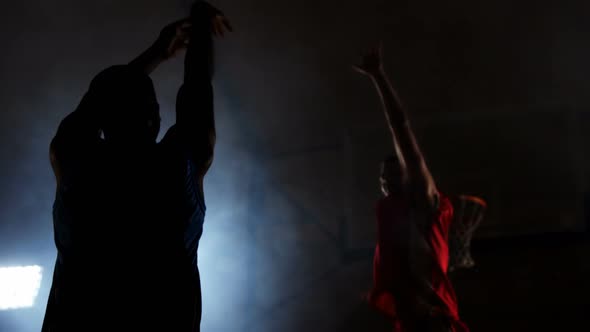 Sportsmen playing basketball