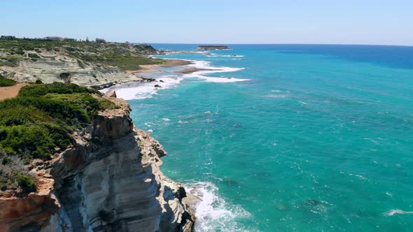 Aerial View of Rocky Mediterranean Coast in Cyprus on Sunny Day