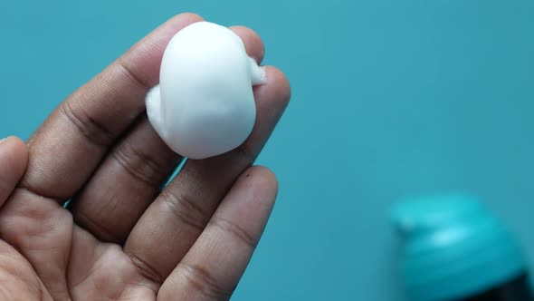 Top View of Shaving Foam on Hand