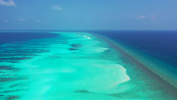 Luxury birds eye copy space shot of a paradise sunny white sand beach and blue water background in v