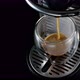 Black coffee machine pouring coffee into the glass cup - VideoHive Item for Sale