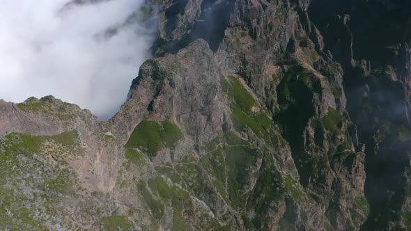 AERIAL: Mountain Top above the clouds in Madeira