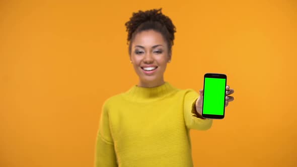 African-American Female Holding Smartphone, Mobile Application Development