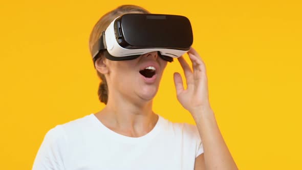 Wondered Woman in Virtual Reality Headset Enjoying Modern Technology, Future