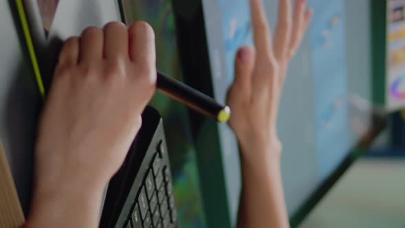Vertical Video Close Up of Media Specialist Hands Using Graphic Tablet
