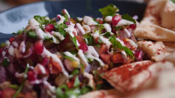 Vegan Tabbouleh Salad With Pomegranate, Chickpeas And Pita Bread.