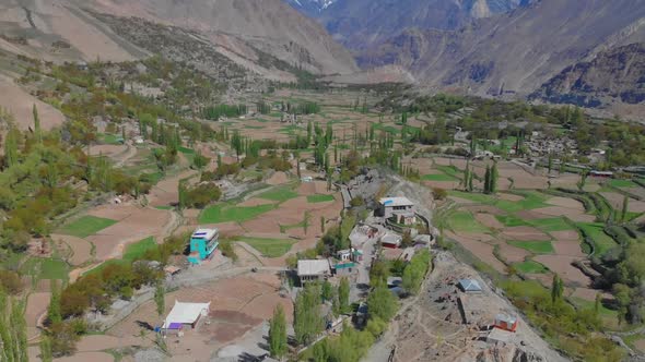 Aerial Over Local Village In Hoper Valley In Pakistan. Pedestal Up