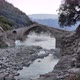 Stone bridge during sunset. Steam coming out of thermal baths - VideoHive Item for Sale