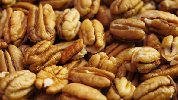 Pecan Nuts Background. Closeup Pekan Seeds