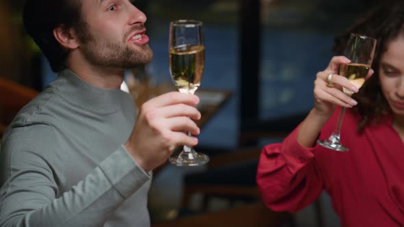 Multiethnic Friends Make Toast in Restaurant