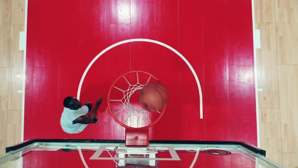 African Basketball Player is Scoring While Throwing a Ball