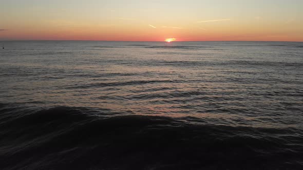 Couple In love enjoying Beautiful sunset sea view.