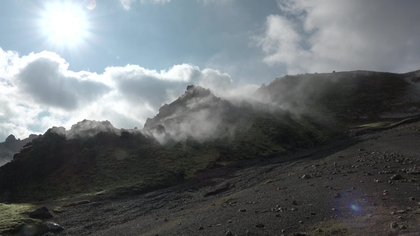 Iceland. Geothermal field with fumaroles and geysers. Natural steam vents. Smoking fumaroles.