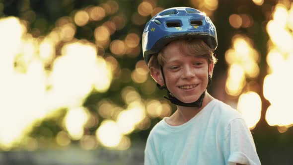 A smiling boy is walking with his father