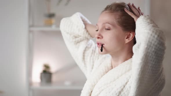 Bathroom Routine Beauty Treatment Woman Tying Hair
