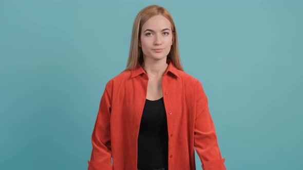 Portrait of a Young Woman Making the Time Out Gesture Asking for a Break