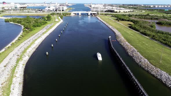 A Boat Travels Through the Canaveral Lock into Port Canaveral, Florida.