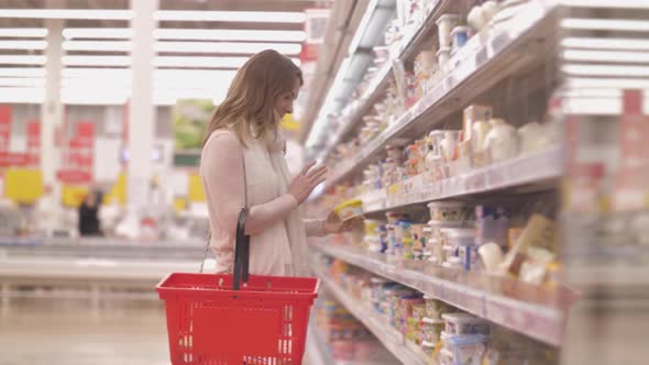 Female Food Basket at Grocery Store or Supermarket Sale Shopping Consumerism