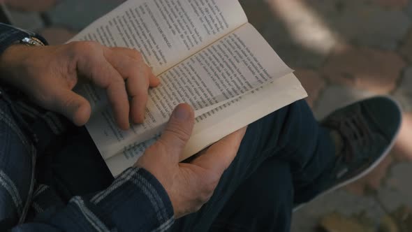 Adult Man Reading Book