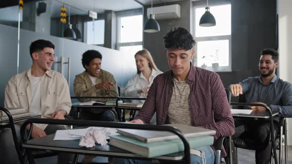 Students Sitting in Classroom Laughing at Classmate Young Frustrated Worried Guy Suffering From