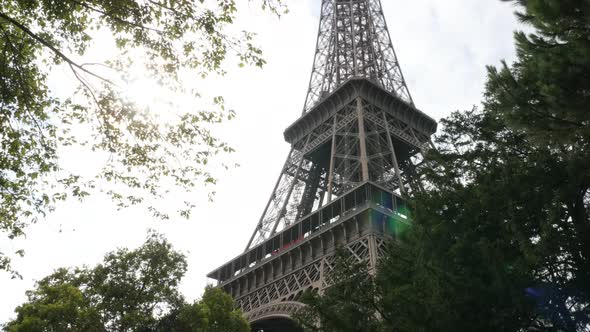 Famous symbol of France and Paris Eiffel tower 4K 2160p UltraHD tilt footage - Beautiful Tour Eiffel