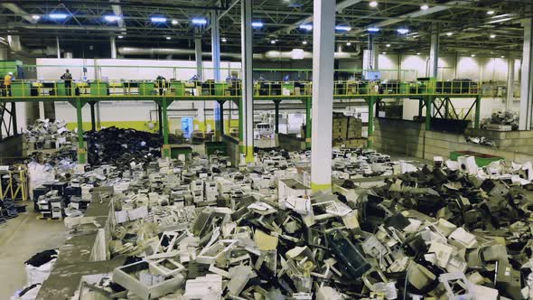 Massive Premises of an Indoors Dumpsite with Waste