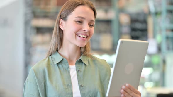 Portrait of Woman Doing Video Chat on Digital Tablet