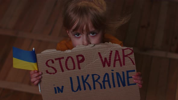 Scared Ukrainian Girl Inscription Massage Stop War In Ukraine Hiding From Bombing Attack at Home