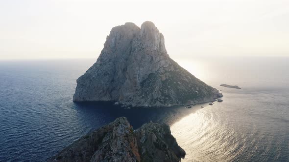 Famous Cliff and Ocean in Ibiza with Sunlight in Background