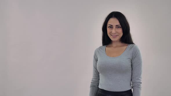 Girl Smiling Shows Sign Kissing