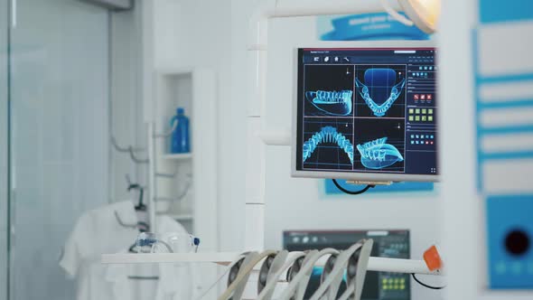 Close Up of Medical Stomatology Display with Teeth x Ray Images on It