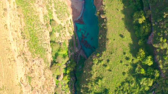 Aerial Top View on Lot of Driftwood in Bluer River on Aksu Canyon in AksuZhabagly Nature Reserve