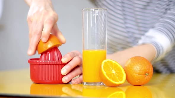 freshly squeezed orange juice in a glass on a table stock video stock footage
