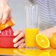 freshly squeezed orange juice in a glass on a table stock video stock footage - VideoHive Item for Sale