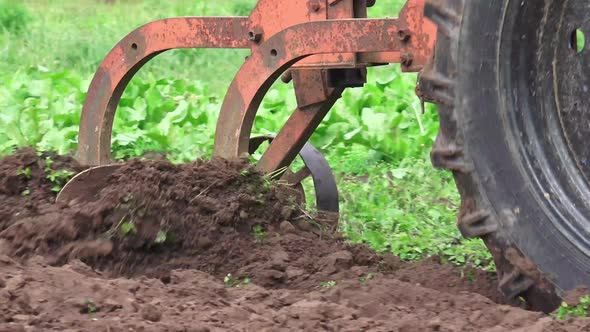 Old Soviet Tractor And Plowing 4