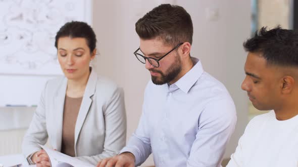 Recruiters Having Interview with Employee 