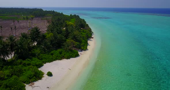 Luxury overhead clean view of a sunshine white sandy paradise beach and aqua blue ocean background i