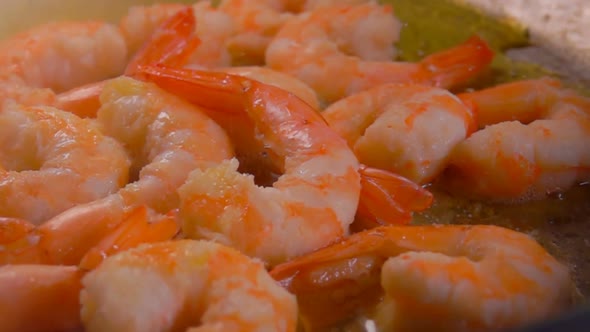 Delicious Shrimps Fried in Olive Oil in a Pan